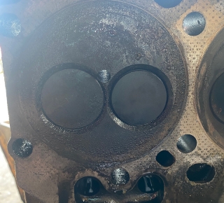 Repairing-blown-head-gasket-on-JD650G-Dozer-Rosenberg-texas3